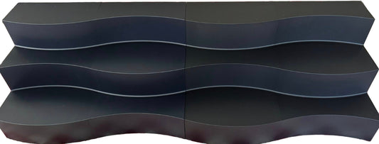 Wavy black shelf with a glossy finish on a white background